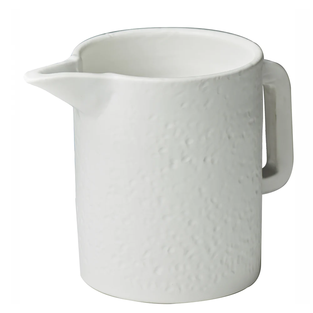 Domino Matte White Hammered Ceramic Pitcher by Abigails