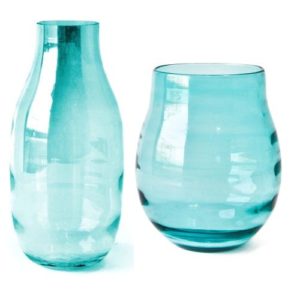 These classically shaped vases are adorned with a subtle lustre sheen in elegant jewel tones. This vase also doubles nicely as a candle holder!